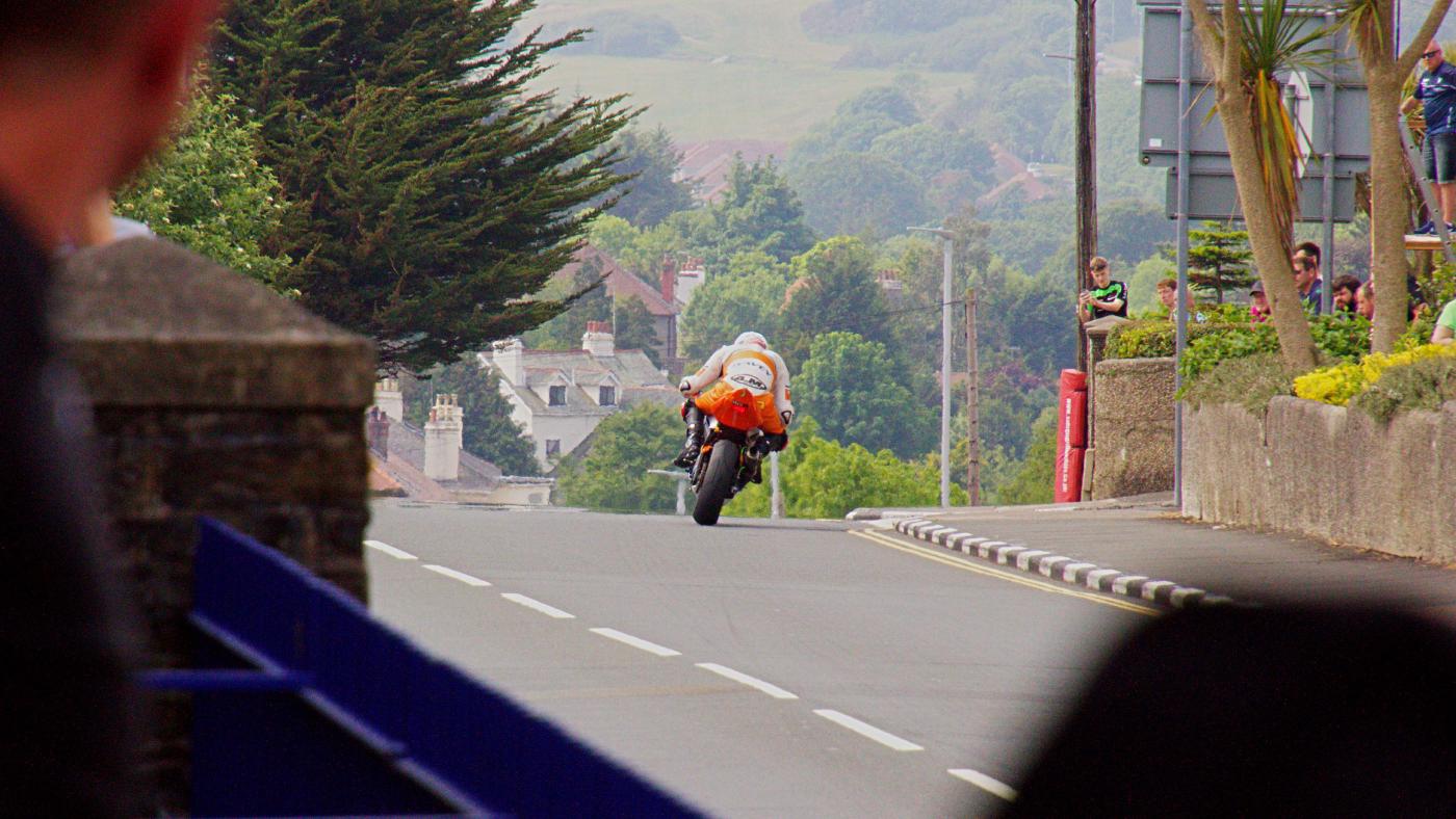 A racer speeding through Douglas